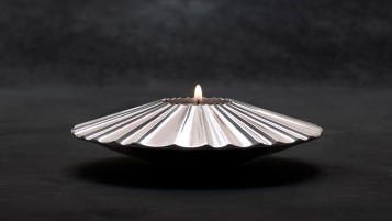 Steel candle holder, made by SSAB using HYBRIT technology.